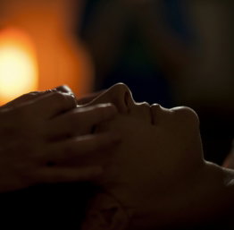 persons hand on top of sun